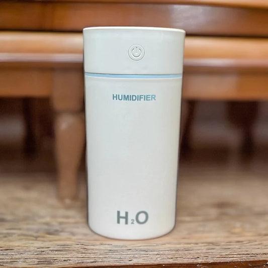 Experience tranquility with Serenity in White: Mute Nano Air Purifier, Aroma Essential Oil Diffuser, and Humidifier - H2O.