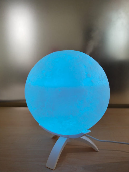 3D moon-shaped lamp doubling as a humidifier and aroma diffuser with USB connectivity.